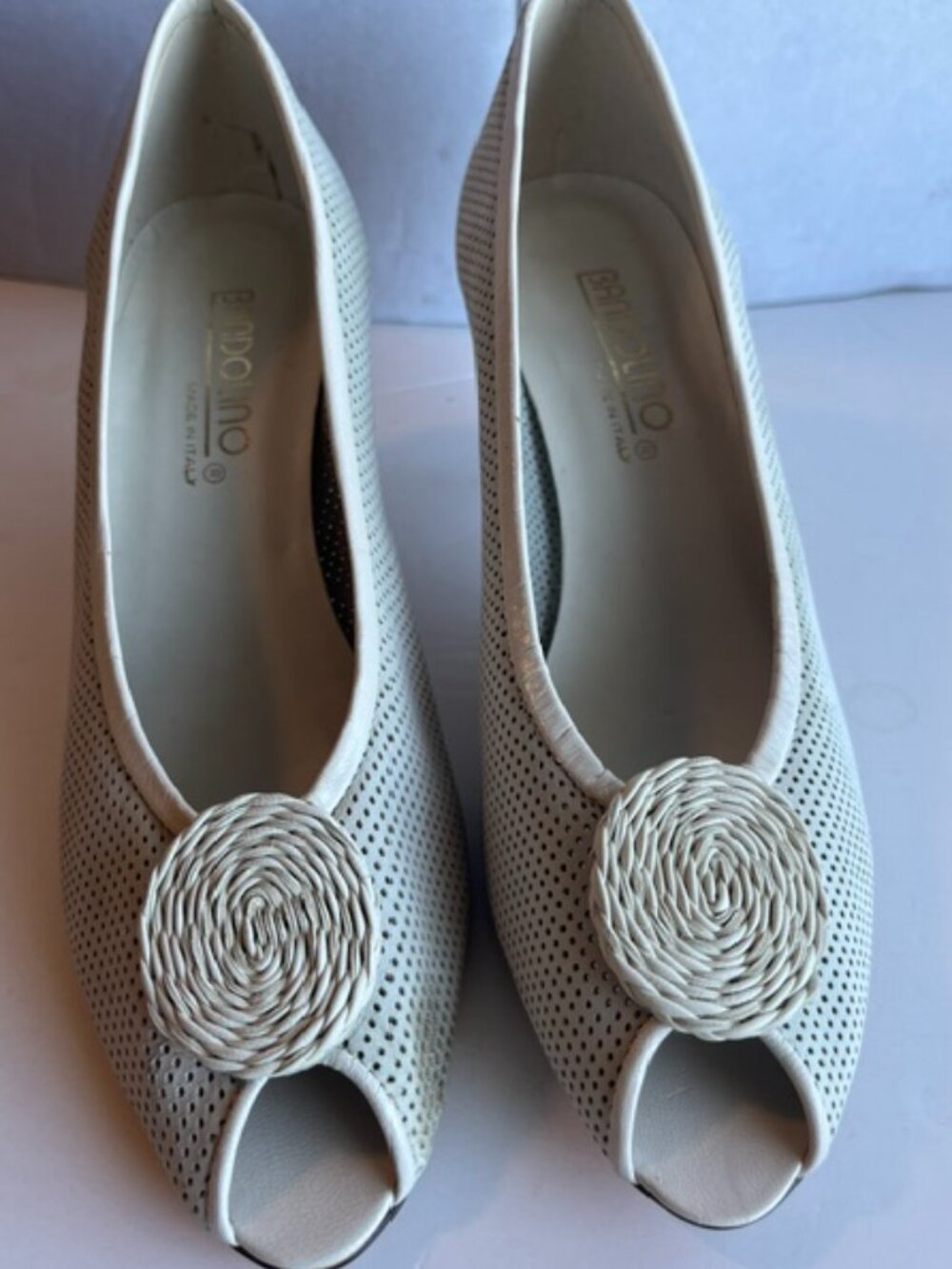 Bandolino peep toe leather pump.